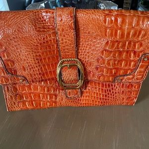 Beautiful reptile orange print clutch